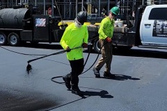 Spraying second coat of sealer